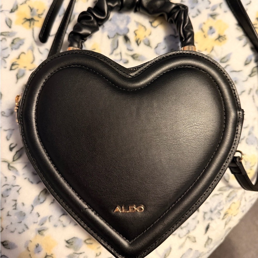 Aldo Black Heart-Shaped Crossbody Bag with Gold Logo